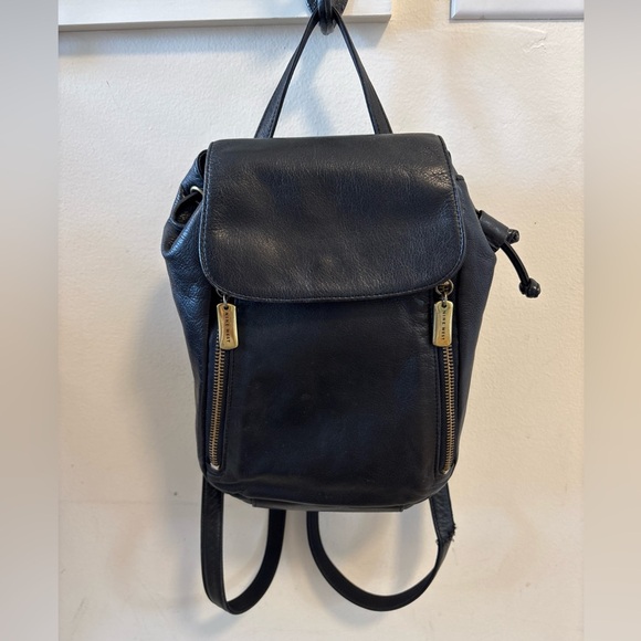 Vintage soft leather mini backpack w/drawstring snap close & front zip pocket - Picture 1 of 10
